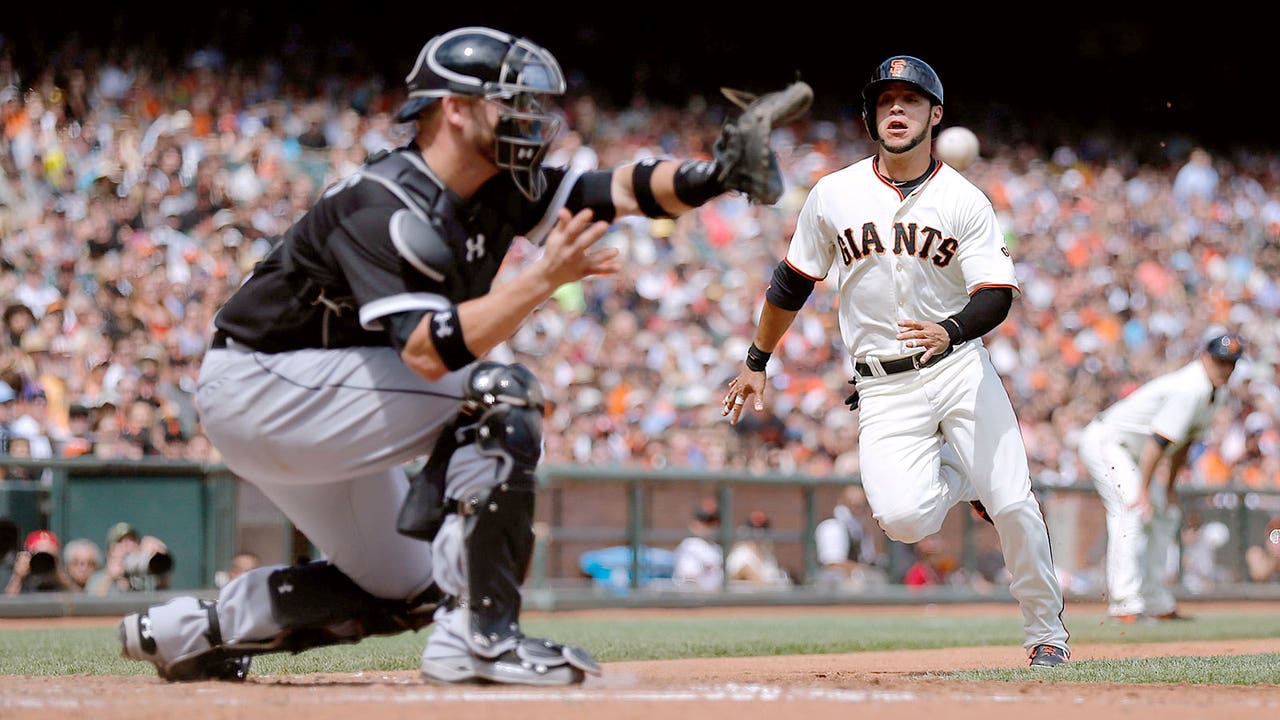 Plate-blocking rule, replay spur Giants past White Sox
